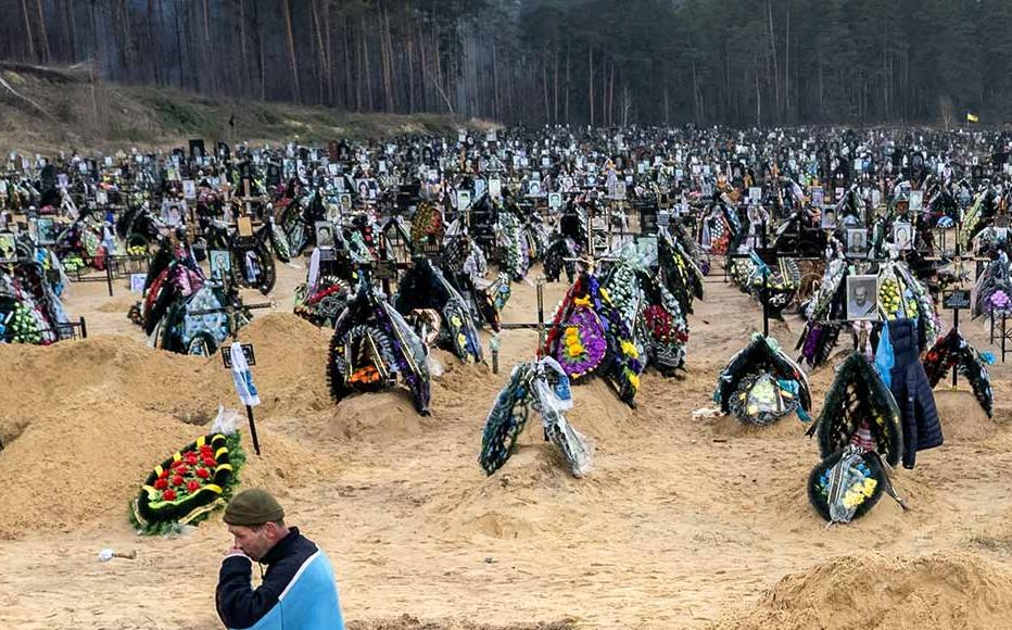 At least 700 murdered civilians have been found in towns around Kiev, according to Ukrainian authorities. The slayings launched investigations for possible war crimes perpetuated by Russian forces during the occupation. Cemetery in Irpin, Ukraine, 21 April 2022.